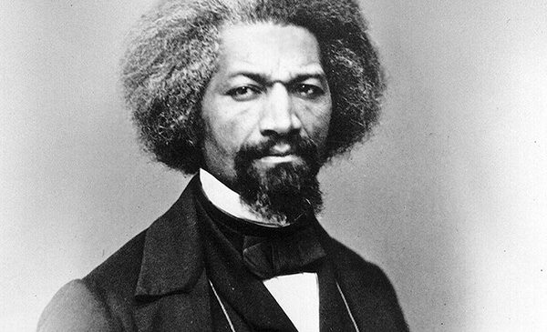 Frederick Douglass posing for photo