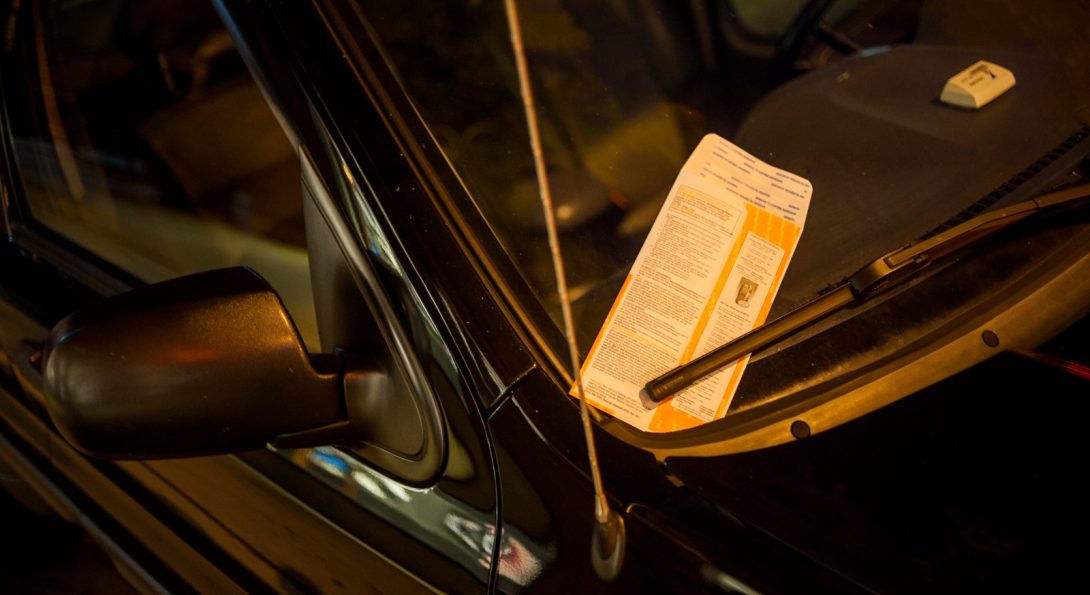 A parking ticket issued by the City of Chicago is displayed in this 2018 file photo.