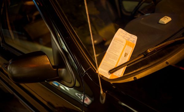 A parking ticket issued by the City of Chicago is displayed in this 2018 file photo.