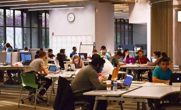 group of students working at the library